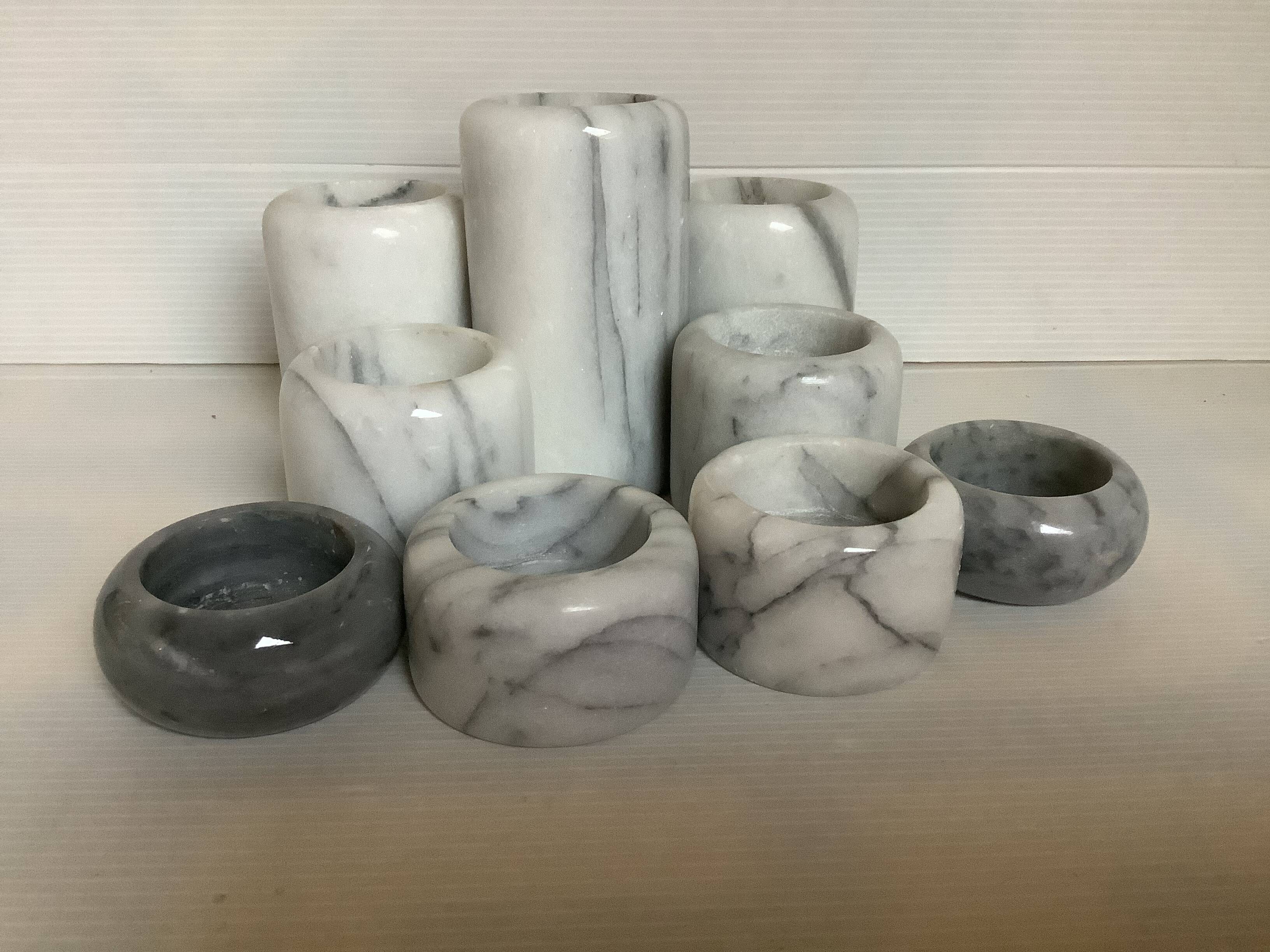 Nine marble candle holders