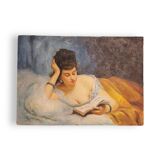 Young woman lying reading oil on panel