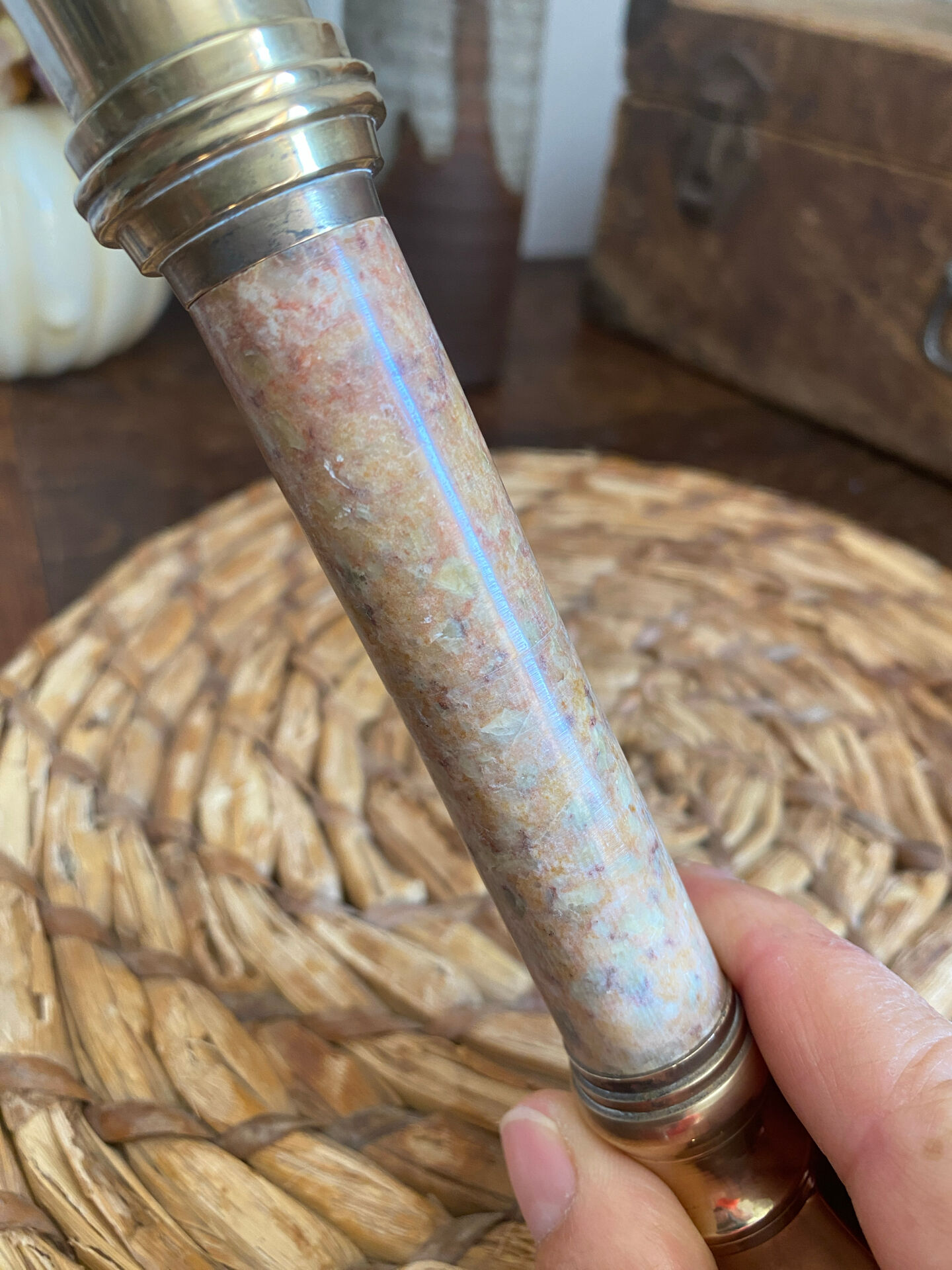 Pair of brass and stone candlesticks