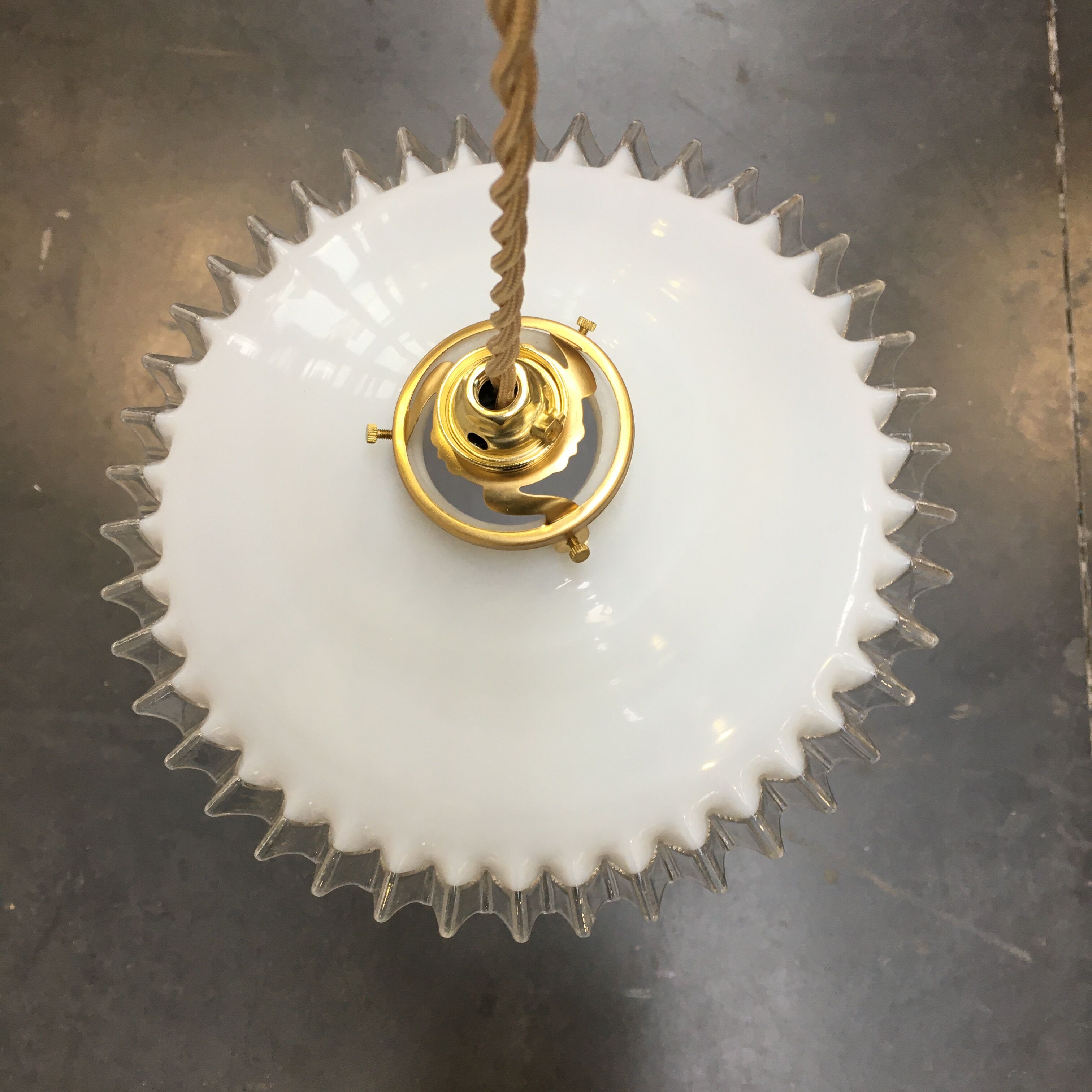 White opaline pendant lamp with transparent serrated edges