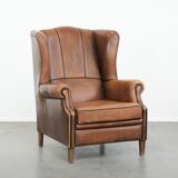 Sheepskin wingback armchair with beautiful colours in good condition