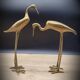Duo brass herons