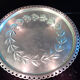 Round dish in silver-plated and glazed metal from the St Médard goldsmith's shop (hallmarks).