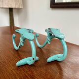 Pair of painted metal wall hooks