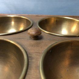 Wood and brass vacuum