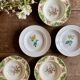 Set of 6 mismatched antique deep plates.