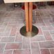 60x60 green marble table with foot formed by four tinted oak logs