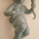 Pairs of wall lights, either two distinct cherubs.