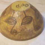 Chamotte clay bowl with bird decoration