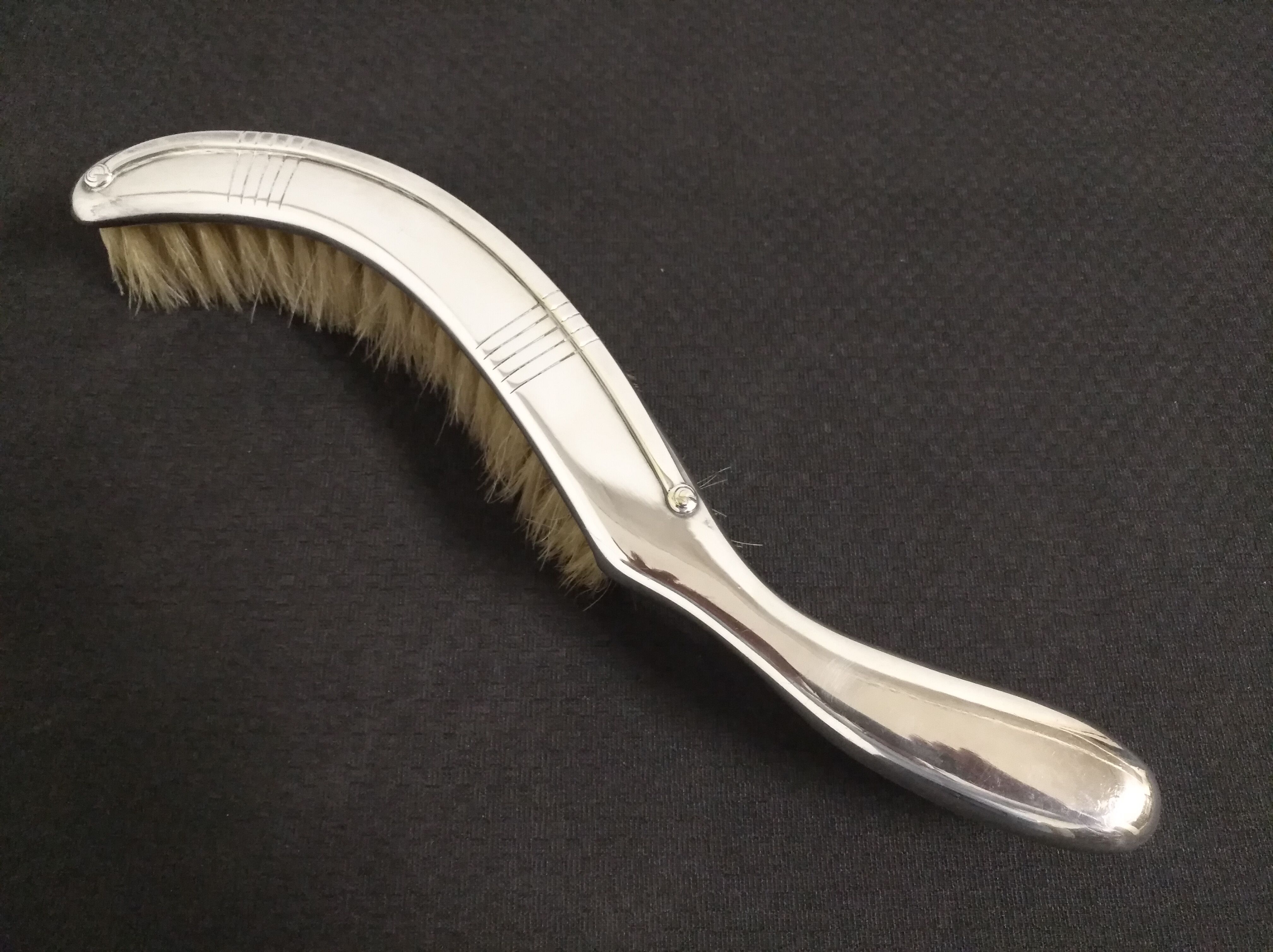 Picks crumbs, peel and table brush in silver metal