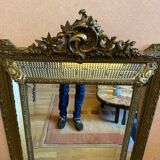 Bevelled mirror with gilded stucco parclose, from the Napoleon III period