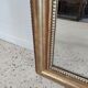Louis Philippe gilded mirror with gendarme hat nineteenth H:130cm
