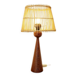 Wooden table lamp in the shape of a bowling pin with a bamboo shade from the 1960s.