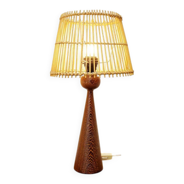 Wooden table lamp in the shape of a bowling pin with a bamboo shade from the 1960s.