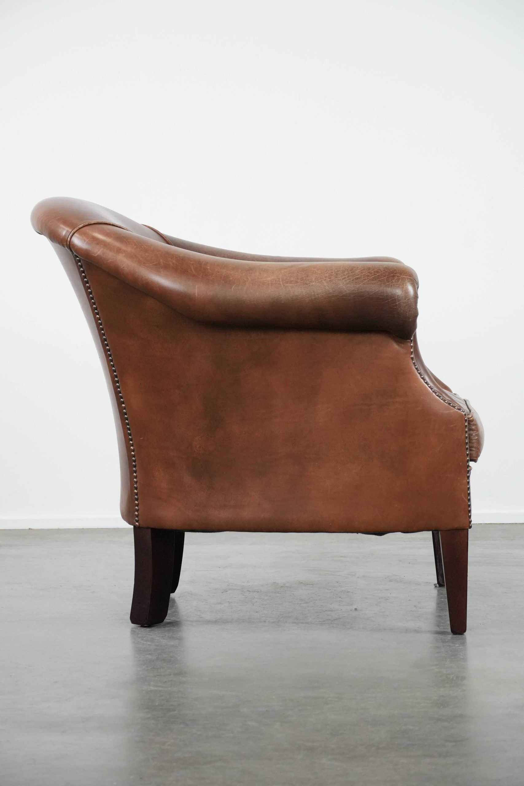 Cognac-coloured vintage cow leather club armchair in English style