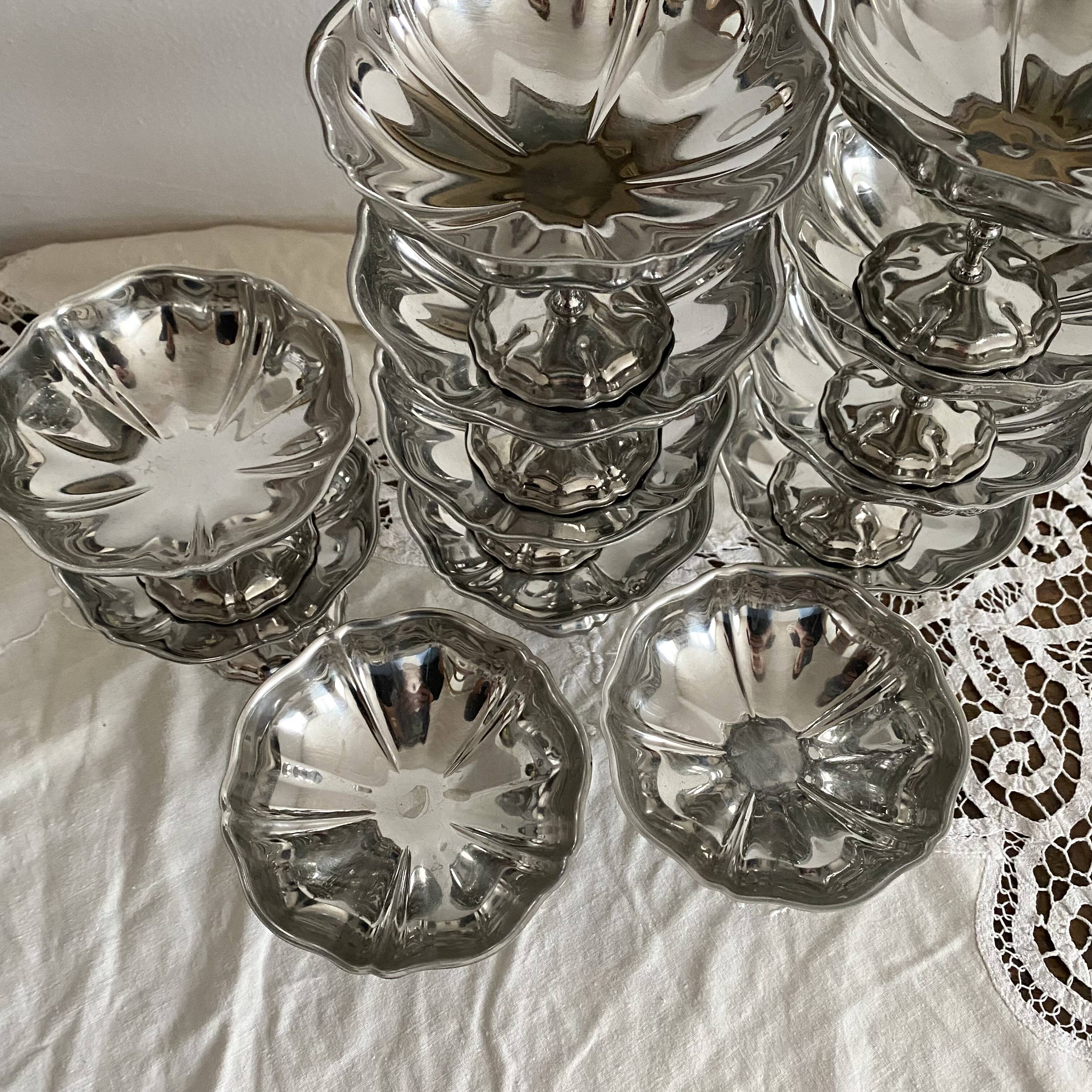 Vintage stainless steel cups on foot