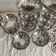 Vintage stainless steel cups on foot