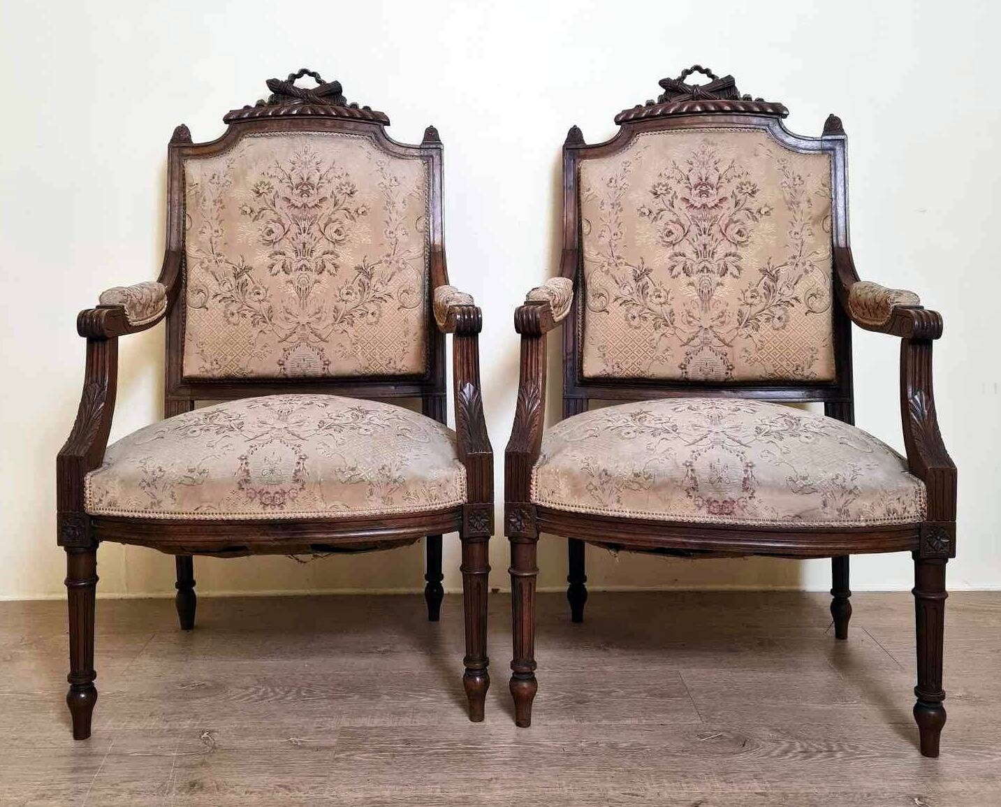 Pair of Louis XVI style queen-style armchairs in richly carved wood