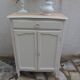 Small vintage buffet reimagined in pearl grey, wooden top.