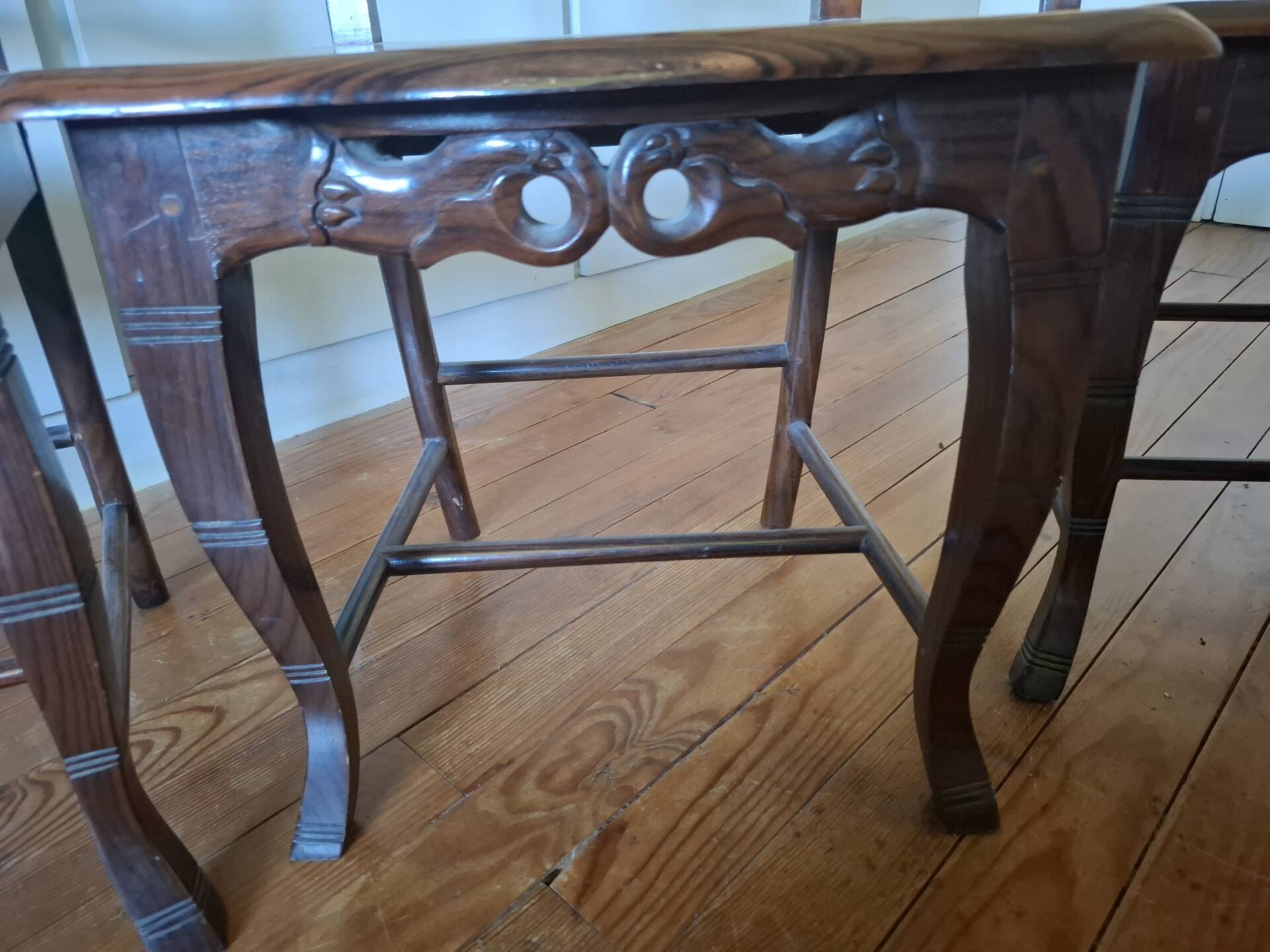 Sculpted chairs in solid wood