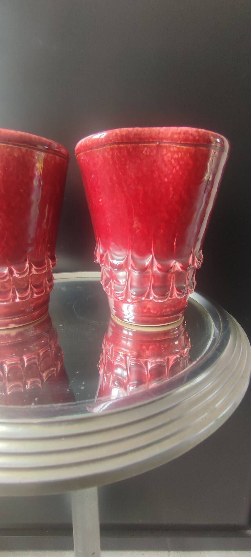 Pair of Art Deco asymmetrical red oxblood ceramic vases