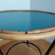 Table basse ronde en rotin et métal revisitée