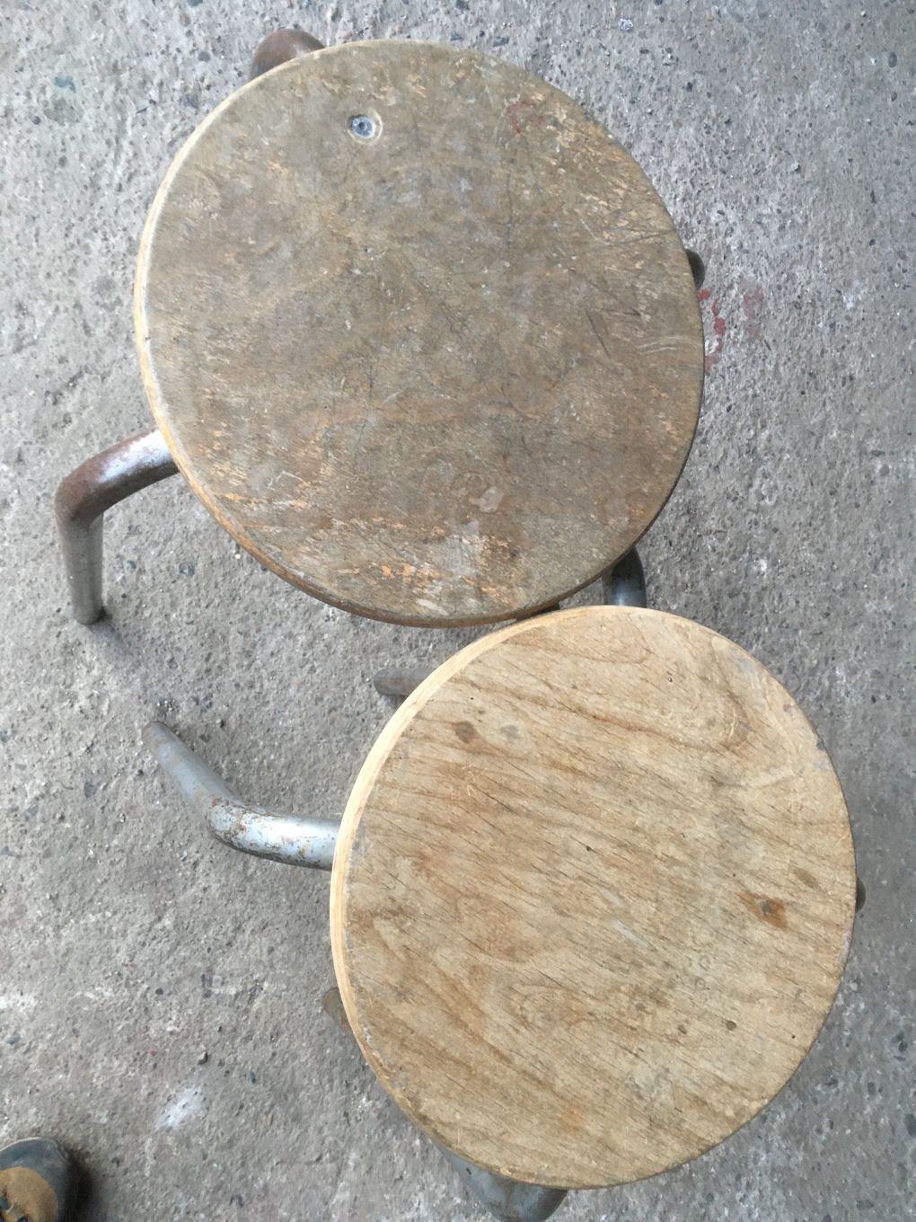 Metal and wood sitting industrial workshop stool