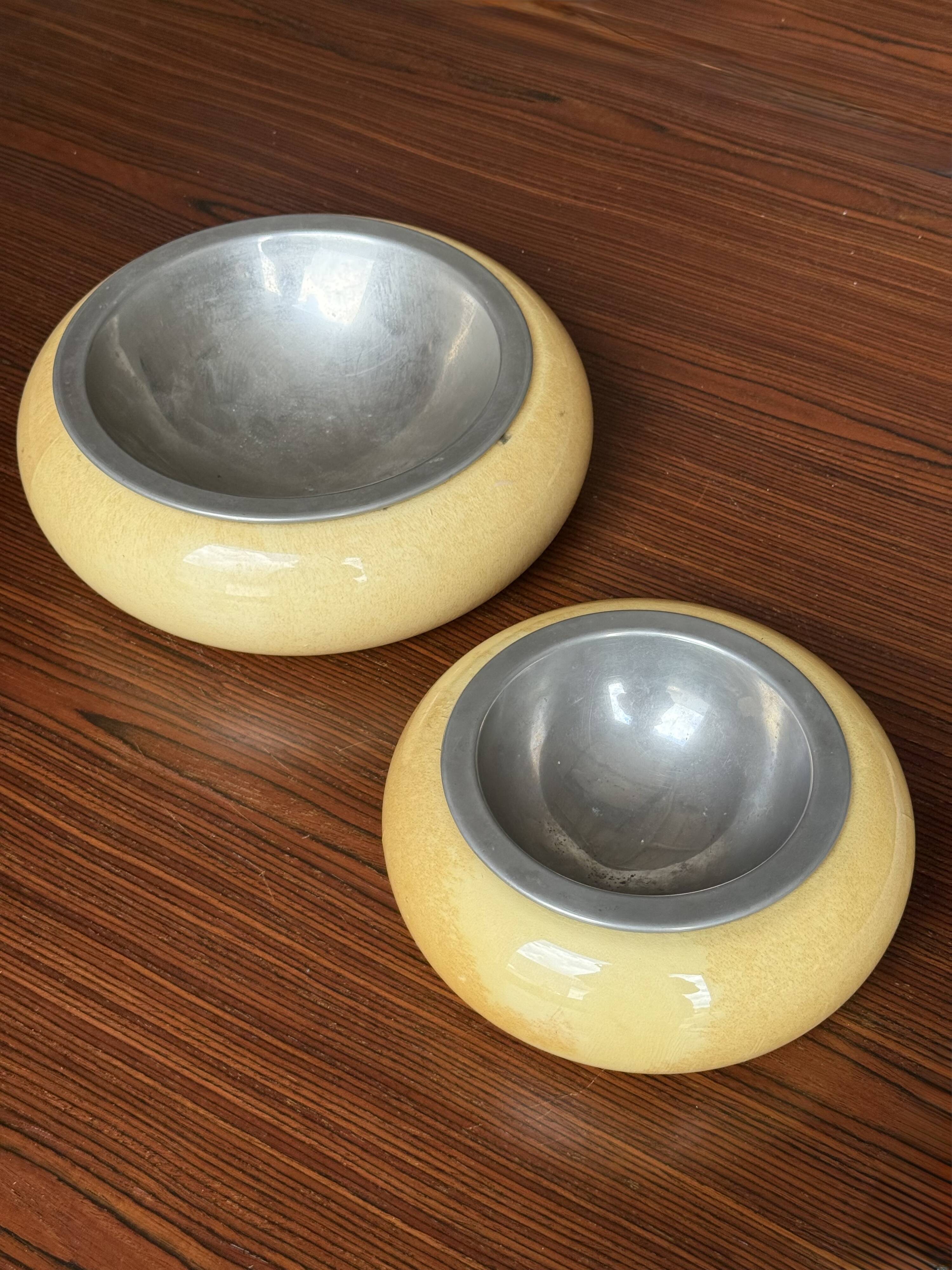 Set of two Aldo Tura bowls in goatskin and brass