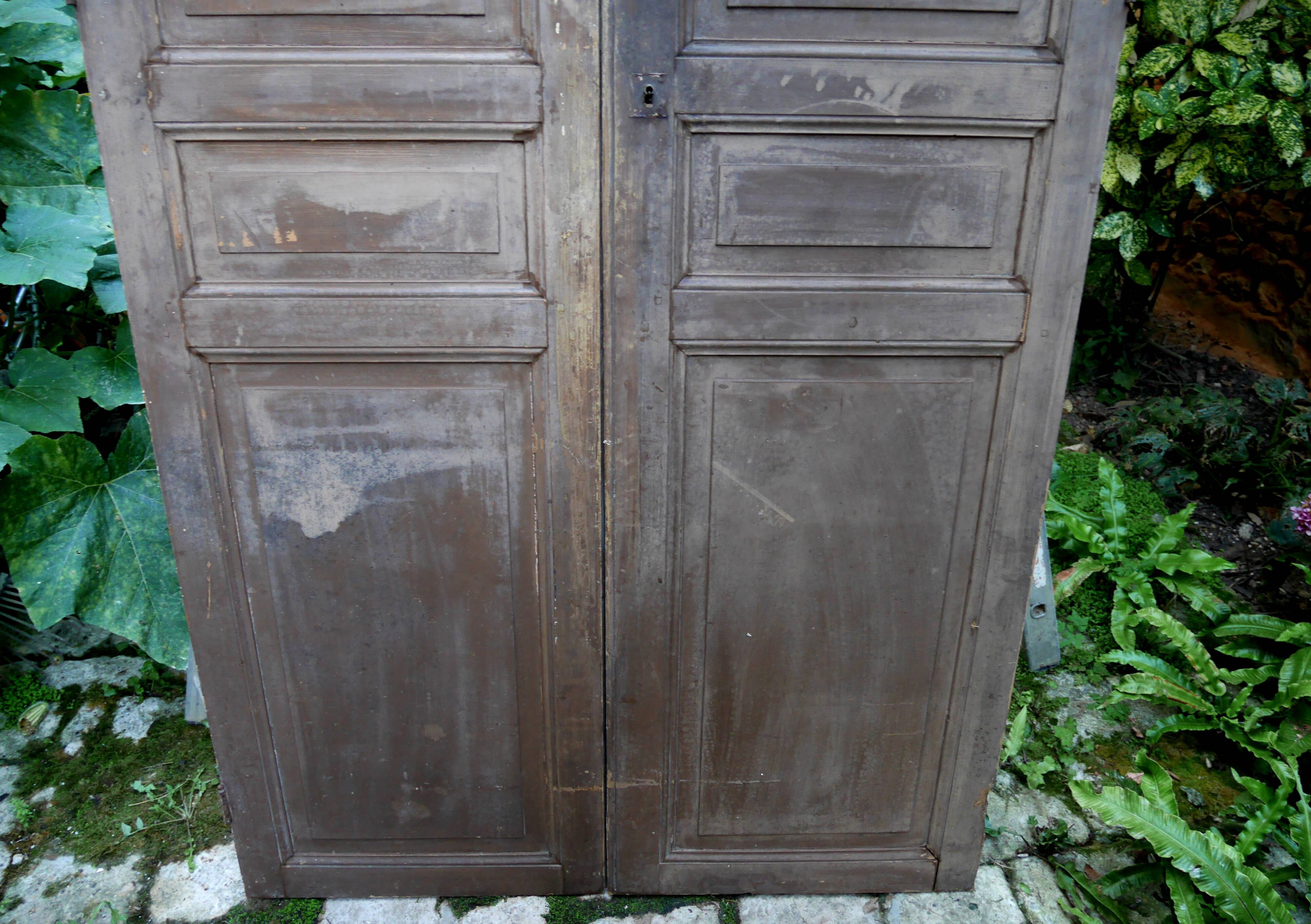 pair of large old wooden doors