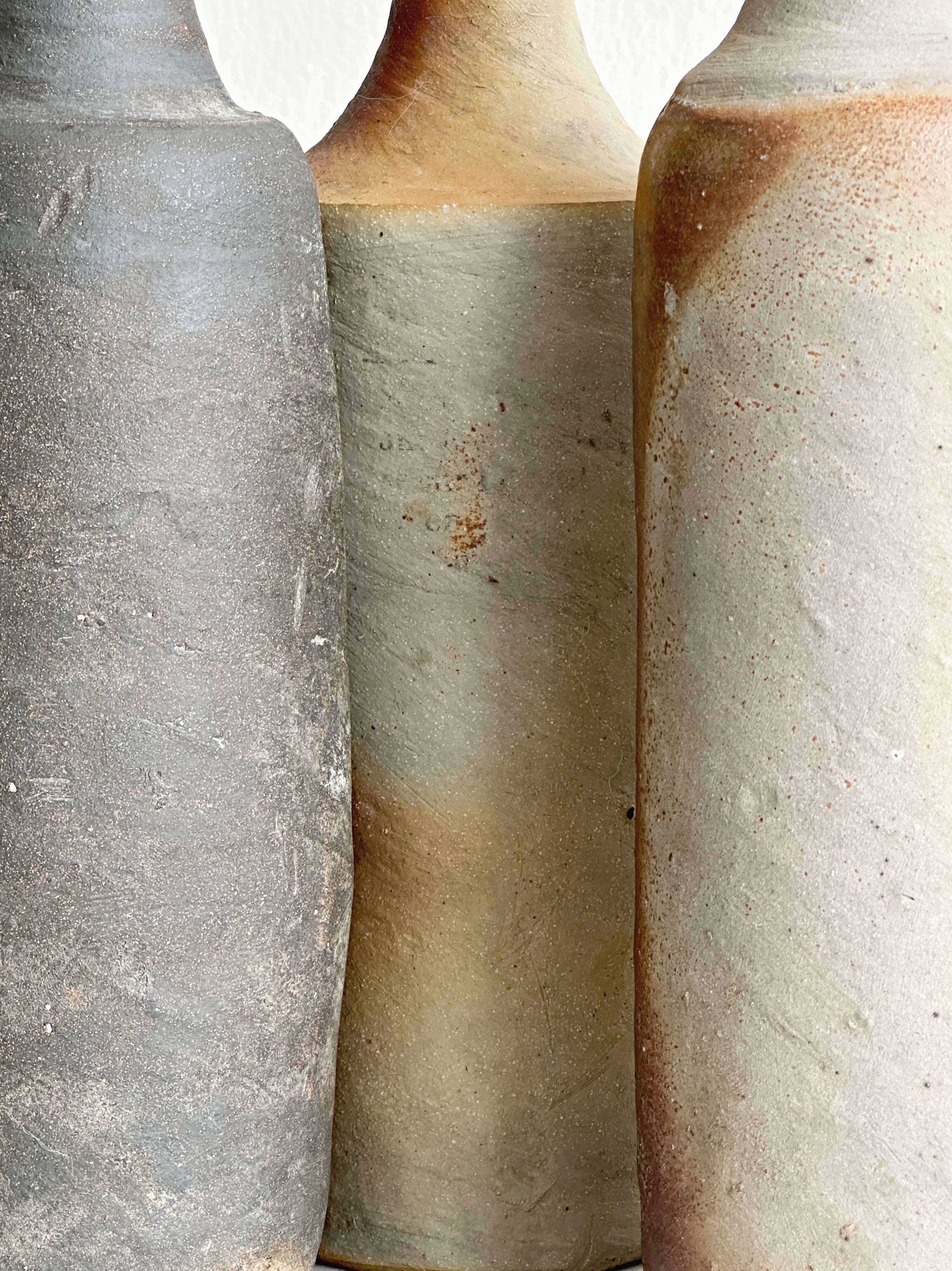 Lot de 3 bouteilles anciennes en grès