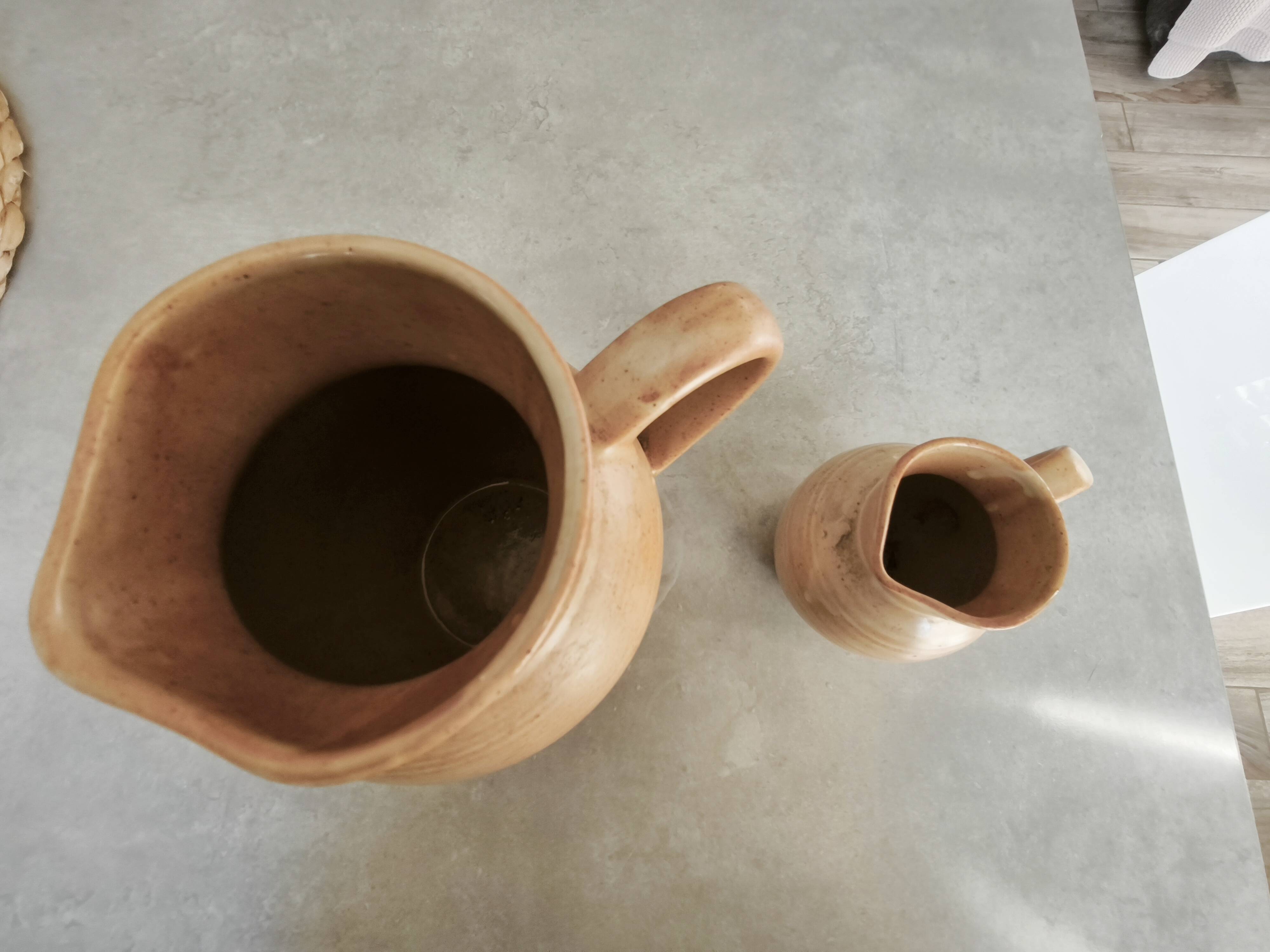 Set of two Village de France stoneware pitchers