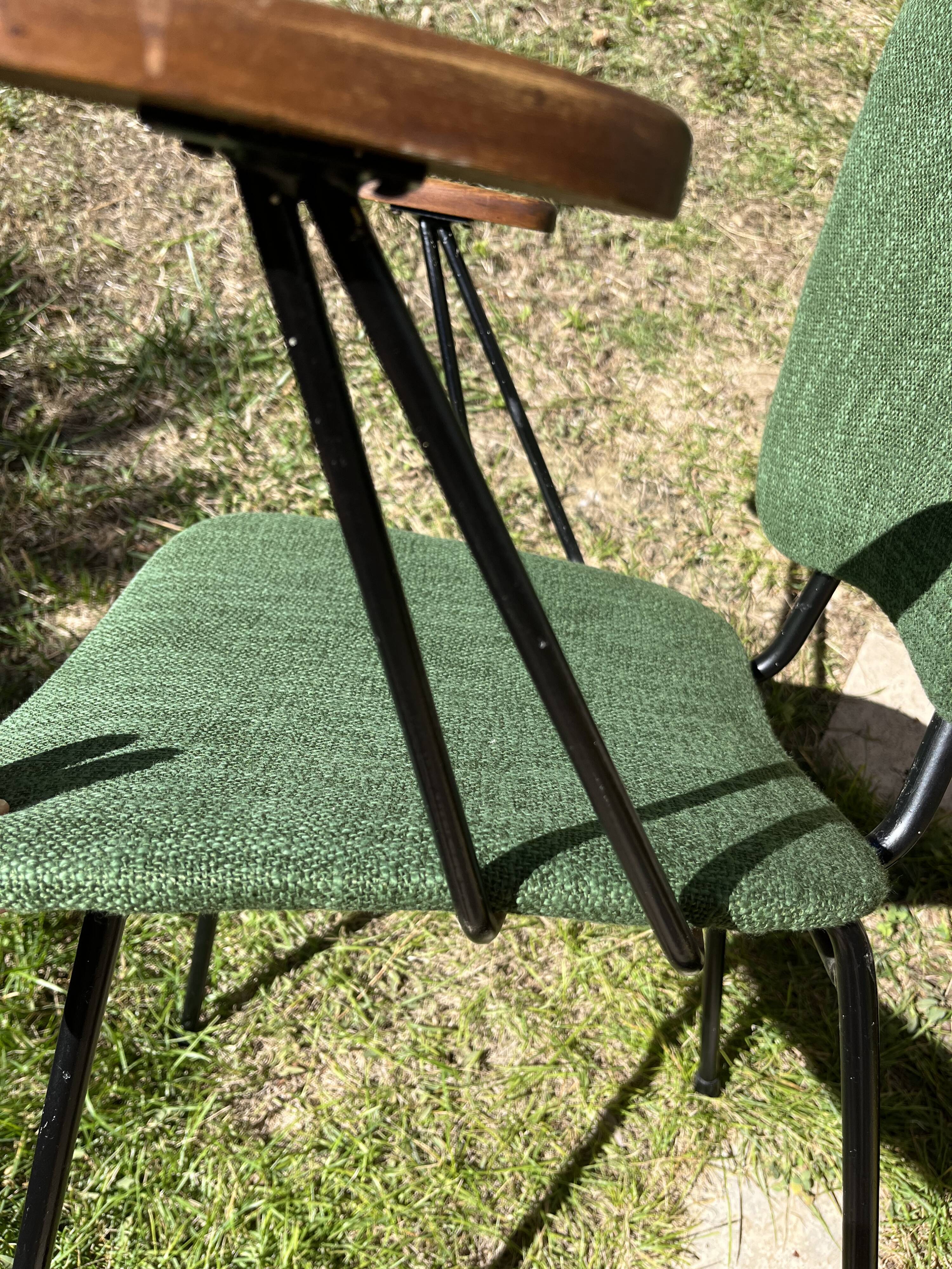 50s chair with armrests.