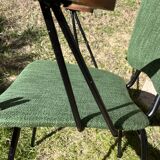 50s chair with armrests.