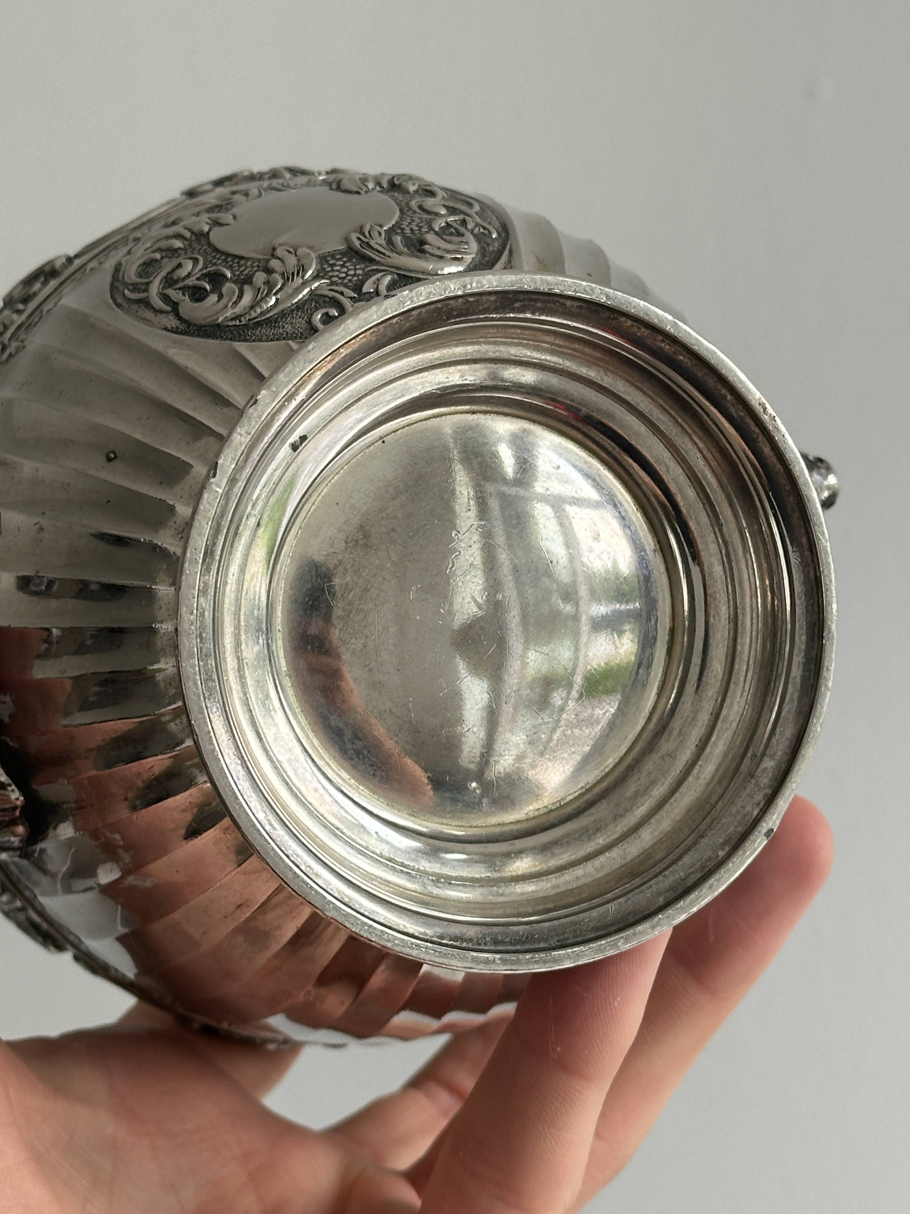 Shiny silver metal cup