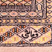 Oriental rug, size 243 x 168 cm, signed and numbered.
