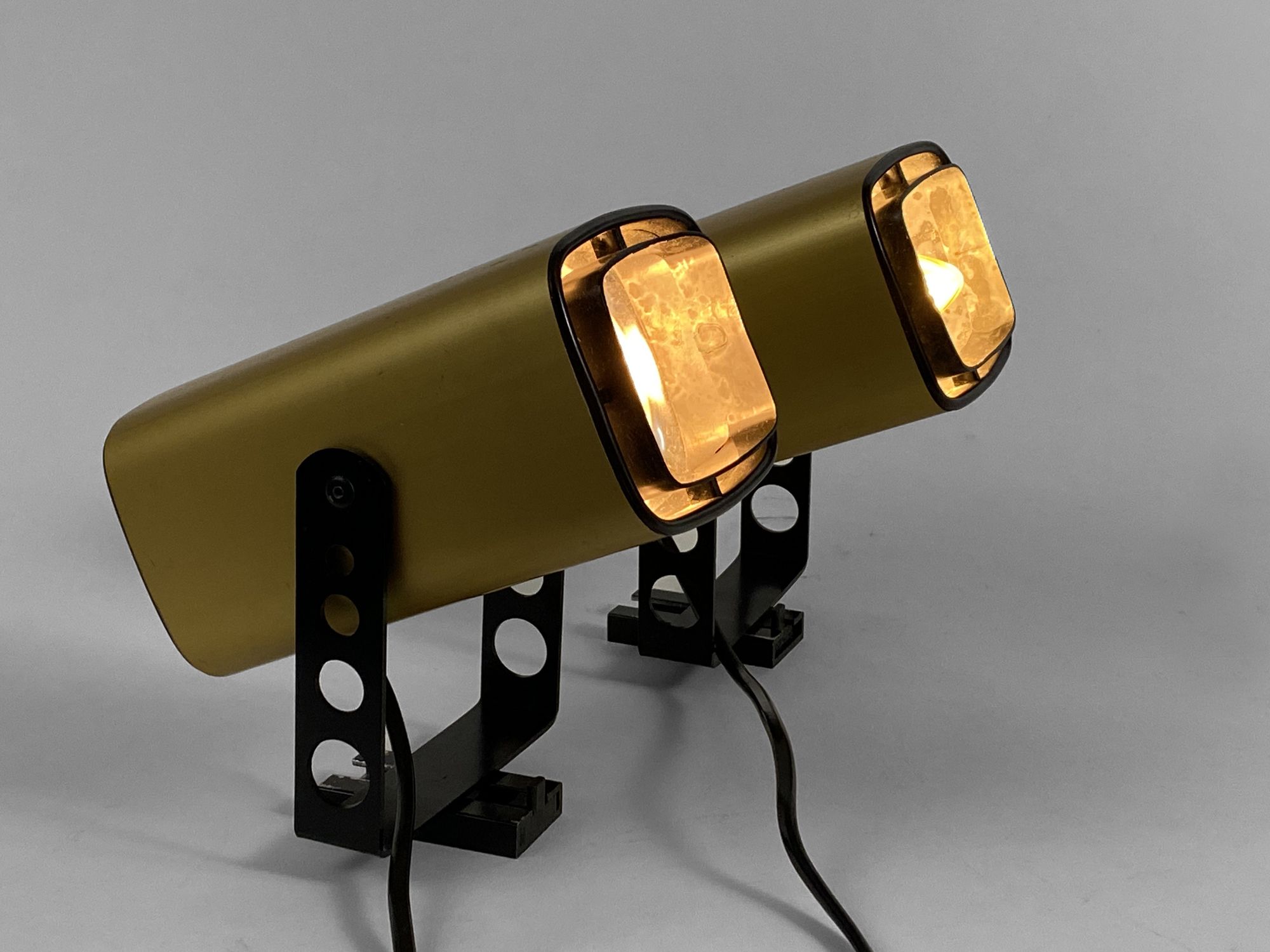 Pair of matte gold bedside wall lamps by Öia. Sweden 1970s