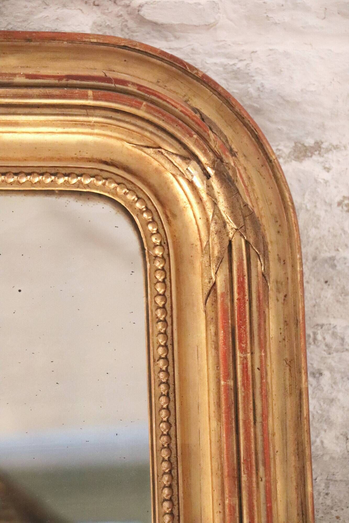 Manor house trumeau mirror in gilded wood, 19th century