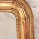 Manor house trumeau mirror in gilded wood, 19th century