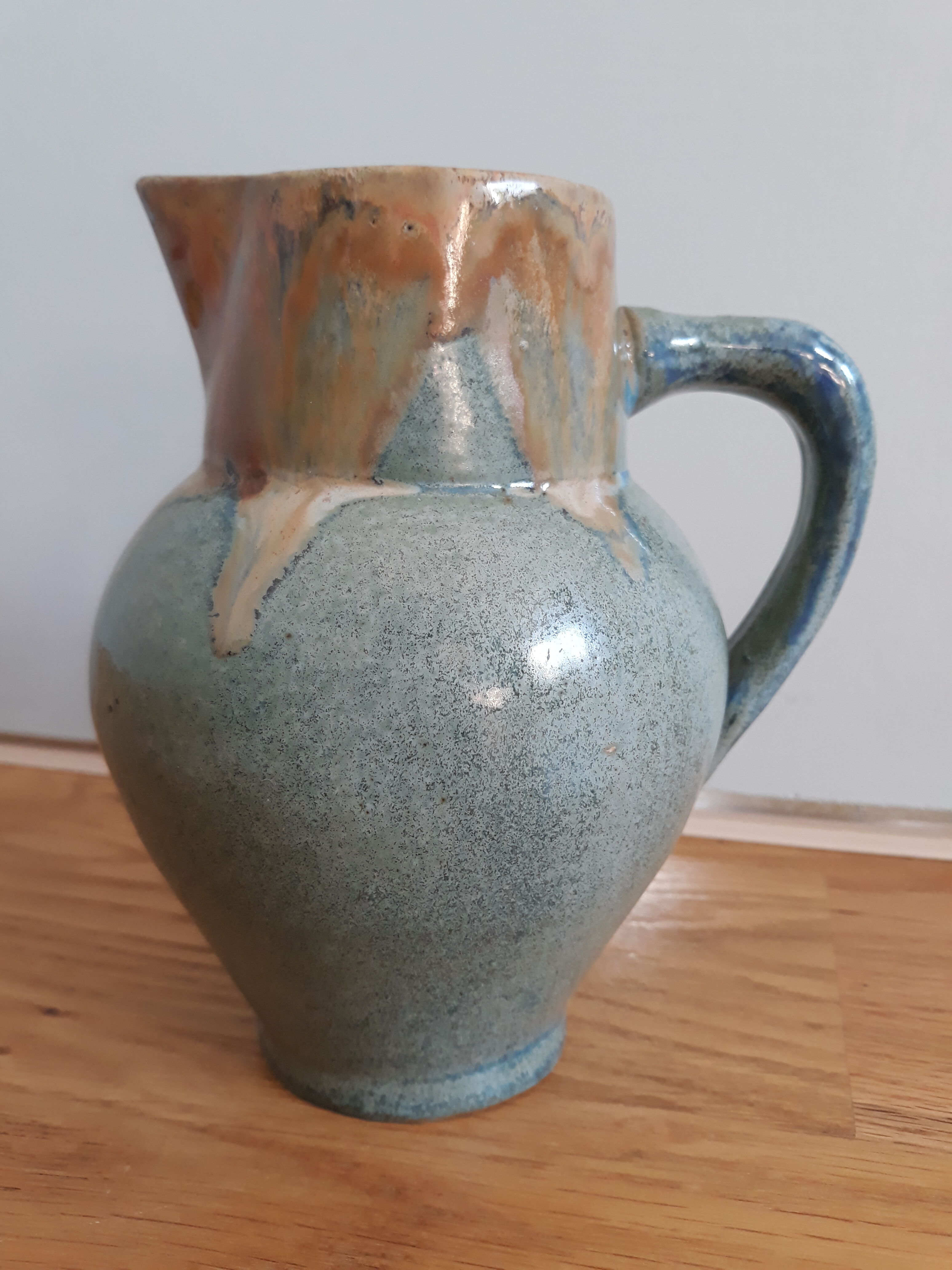 Pitcher ceramic  tones blue, green and caramel