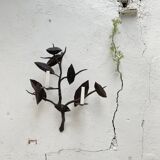 Wall lamp in wrought iron.