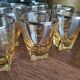 Set of 8 tinted glass shooter glasses with silvering