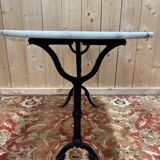 Authentic bistro table with white marble and cast iron from the early 20th century.