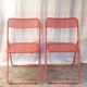 Orange metal folding chairs (set of 2) - 70s/80s