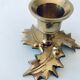 Candlestick in brass holly design