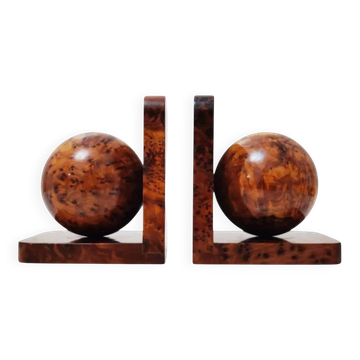 Art Deco bookends made of polished solid burl wood.