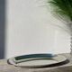 Oval stainless steel dish signed Rémi Letang
