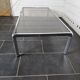 Chromed metal coffee table with smoked glass top from the 70s