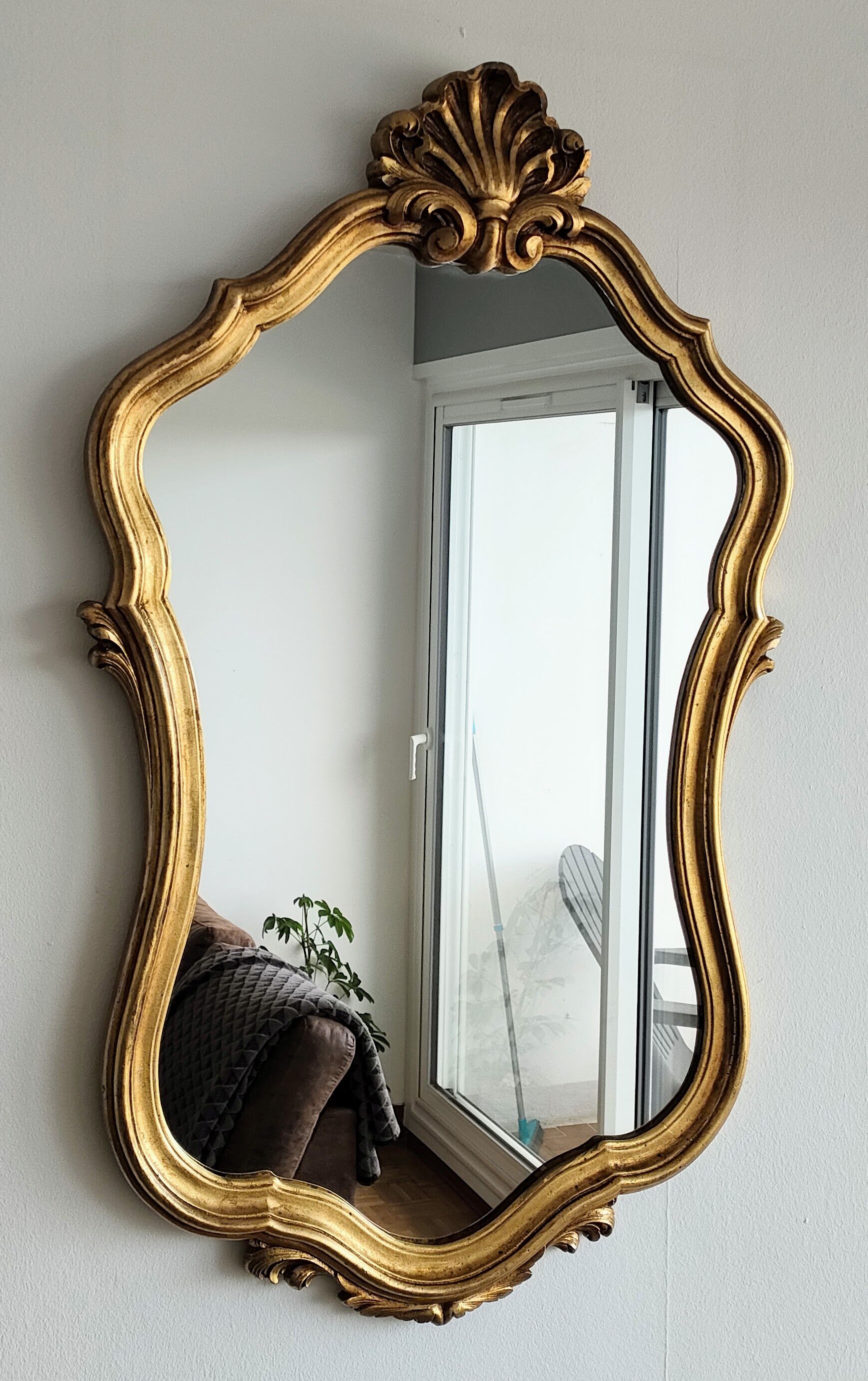 Large gilded mirror shell Louis XV style