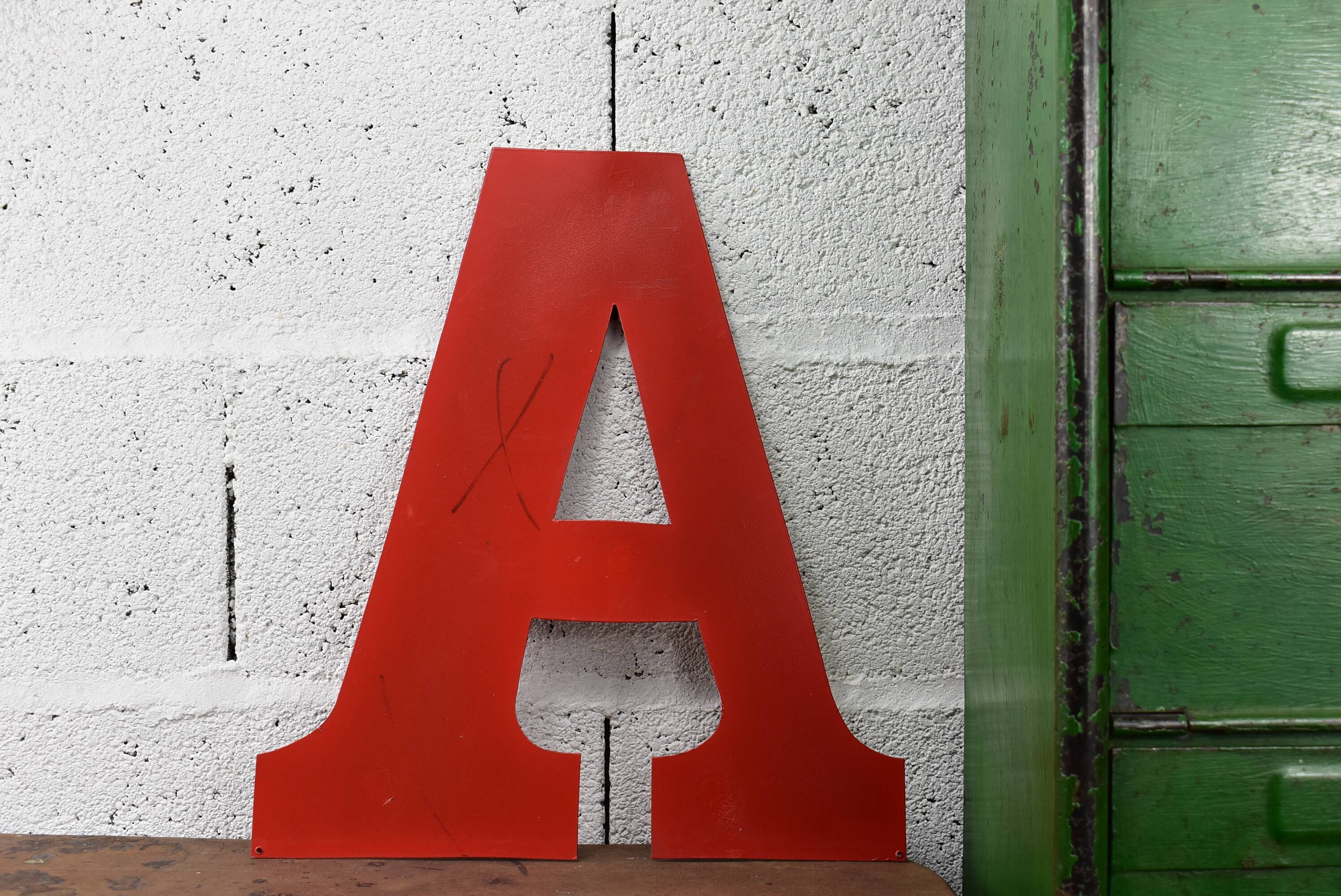 Industrial letter "A" in red metal