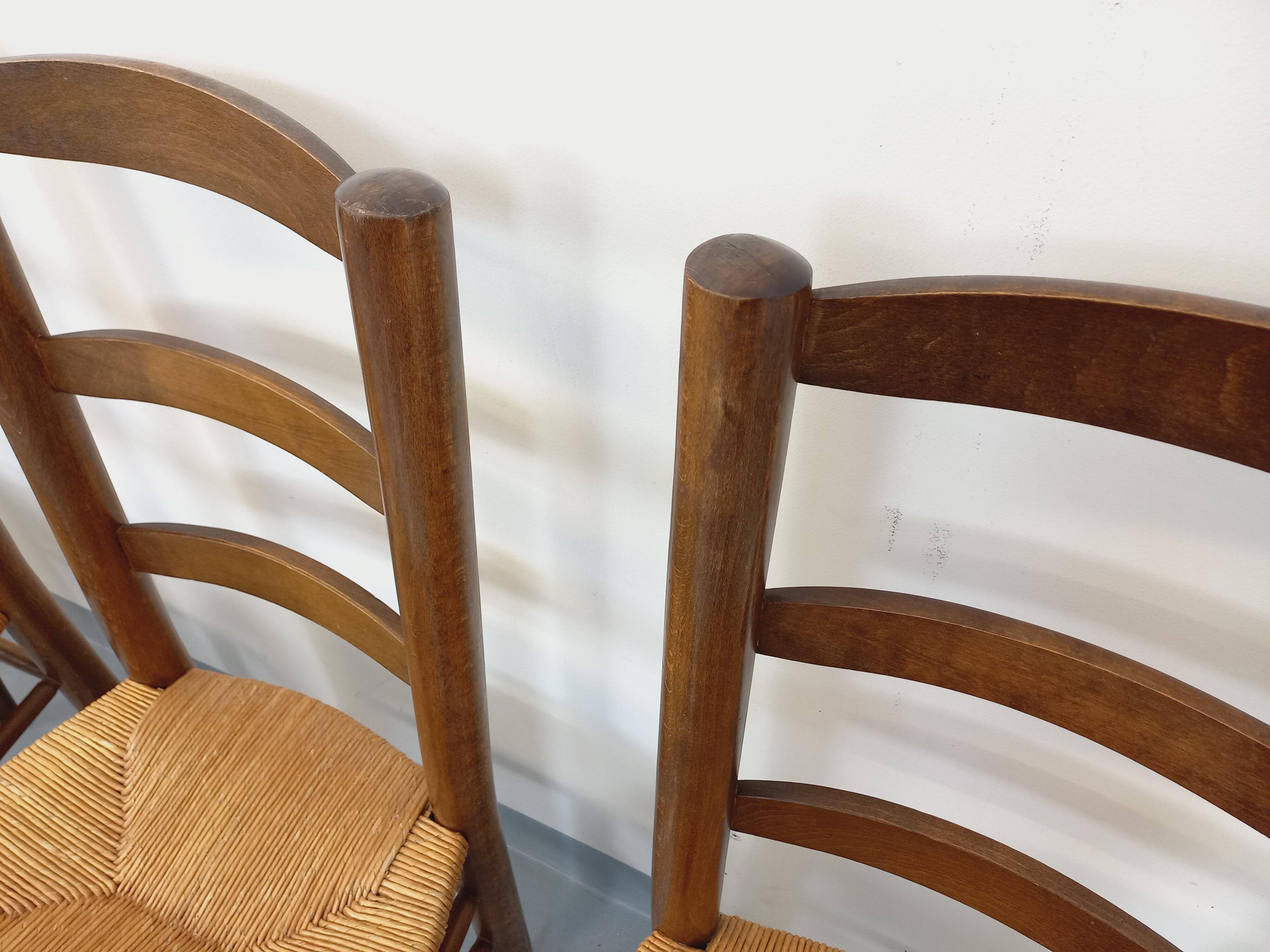 Set of 4 vintage brutalist chairs in wood and straw from the 1960s.